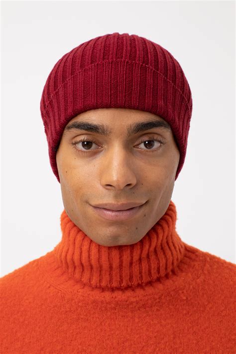 Cappelli Supreme rosso per Uomo .